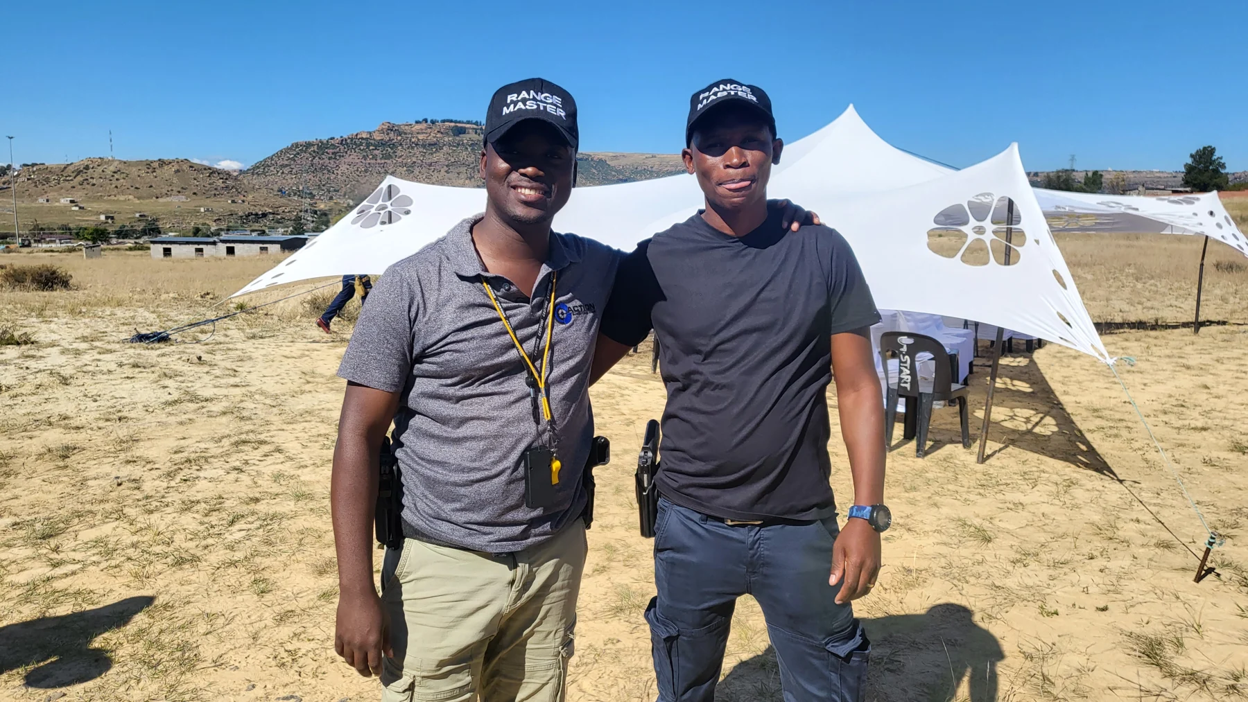 Range masters at an outdoor event
